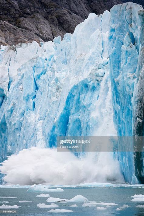 Icebergs Calving From Dawes Glacier In Alaska High-Res Stock Photo ...