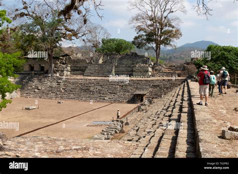 Copan Honduras travel - tourists looking at the ancient mayan ruins at Copan UNESCO World ...