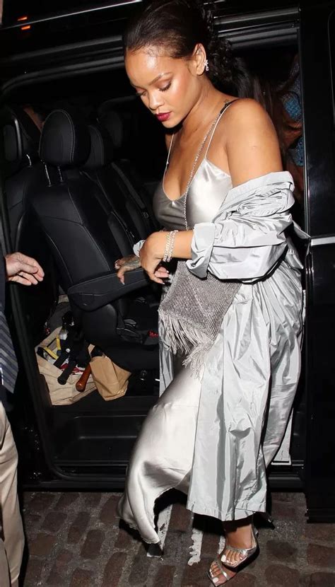 Rihanna Slips Into Slinky Silver Dress For Night Out In London After