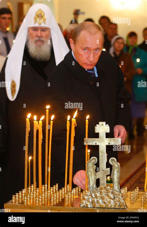 With Russian Orthodox Patriarch Alexy Ii In The Background President