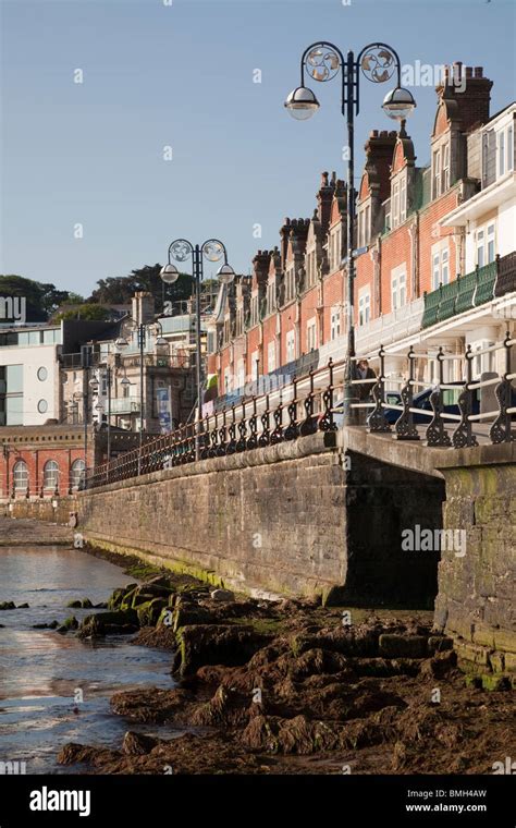 Promenade Sea Wall Slipway And Stone Groynes At Swanage In The Early