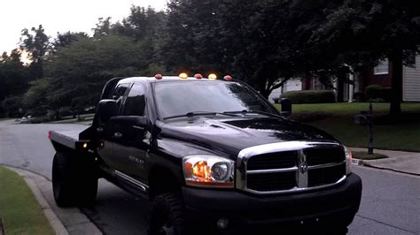 Cummins dually flatbed lifted on 37s - YouTube