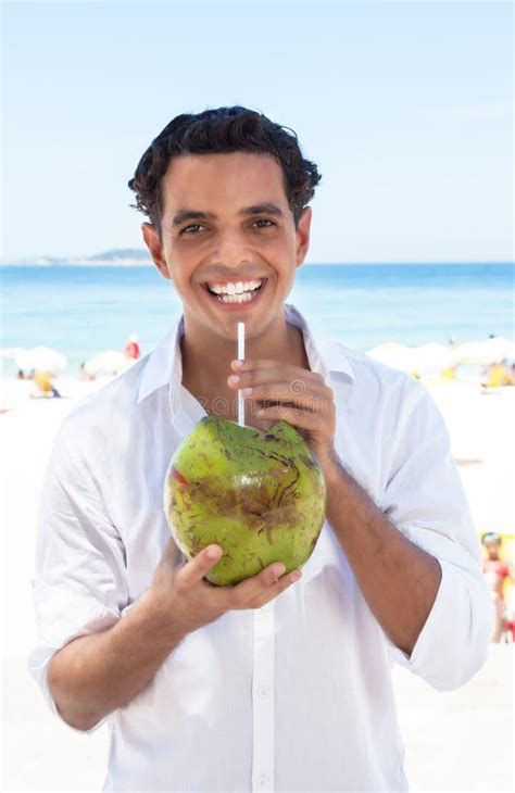 146 Man Drinking Coconut Water Beach Stock Photos Free And Royalty Free