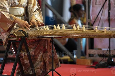 Koto japanese harp 19083540 Stock Photo at Vecteezy