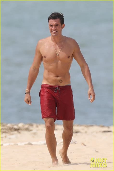 Orlando Bloom Goes Shirtless In Low Riding Trunks At The Beach Photo