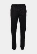 Bikkembergs PANTS - Tracksuit bottoms - black/black - Zalando.ie