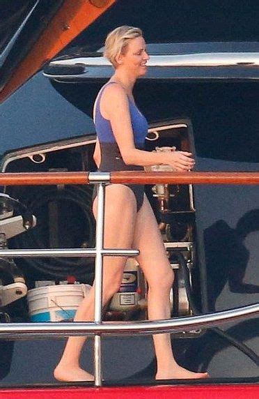 Retro Bikini Princess Charlene Kicks Off A Blue Bikini As She