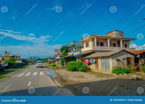 POKHARA, NEPAL OCTOBER 10, 2017: Pavement Street with Some Old Buildings in a Sauraha Town ...