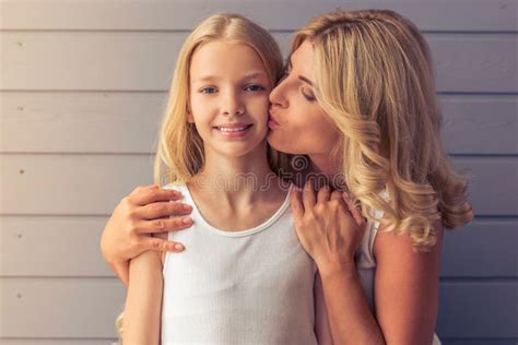 Mother Kissing Her Teen Daughter Stock Photos Free Royalty Free