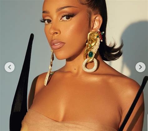 Singer Doja Cat Shares Snazzy Photos Of Her Chest Revealing Outfit At Billboard Music Awards