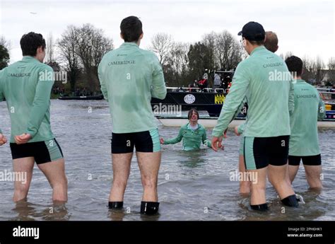 Cambridge Men S Cox Jasper Parish Is Thrown Into The River After The