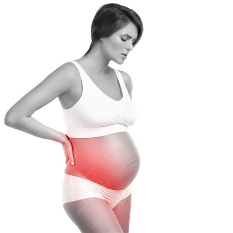 Premium Photo | Pregnant woman has pain in her lower back or problems