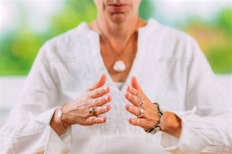 Heart centering meditation. Stock Photo by microgen | PhotoDune