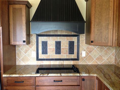 Metal Art Accents Add That Something Extra To The 6x6 Tile Installed In