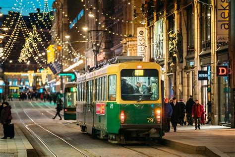 Helsinki Finland Tram Departs From Stop On Aleksanterinkatu St