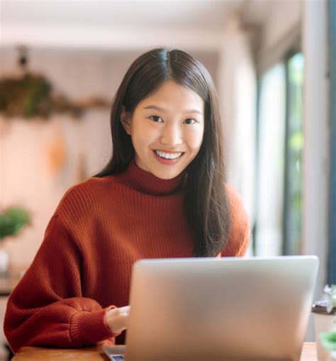 4800 Pretty Chinese Asian Student Woman Working On Her Laptop