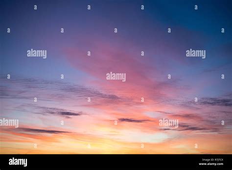 Beautiful sunset, clouds in many colors Stock Photo - Alamy