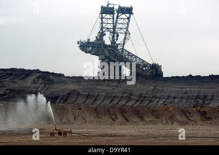 Bucket Wheel Excavator Mining In A Brown Coal Open Pit Mine Stock Photo