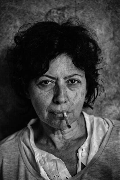 Premium Photo Close Up Portrait Of Mature Woman Smoking Joint