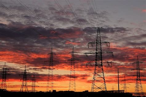 Premium Photo Electricity Transmission Pylons And Power Lines At Sunset