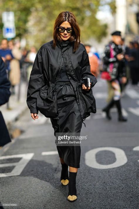 Christine Centenera Wears Sunglasses A Black High Neck Oversized