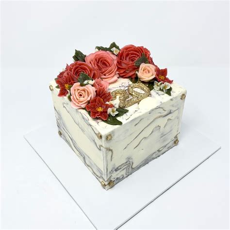 Made a square marble buttercream cake (with buttercream flowers) for ...