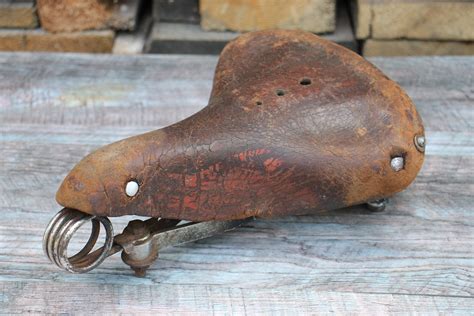 Element Of A Classic Vintage Bicycle In Retro Leather Bicycle Saddle