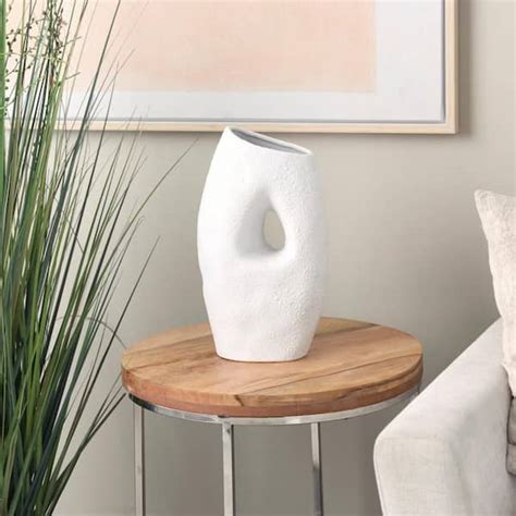 Litton Lane White Textured Ceramic Abstract Decorative Vase With Cutout