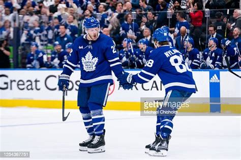 Jake Mccabe Of The Toronto Maple Leafs And William Nylander Celebrate