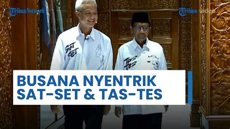 Busana Nyentrik Kemeja Putih Tulisan Sat Set And Tas Tes Ganjar Mahfud