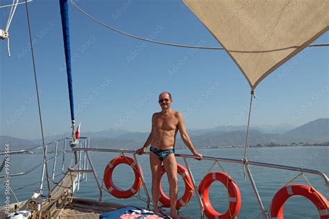 Mature Man Is On The Deck Of The Yacht Stock Photo Adobe Stock