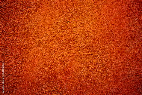 Orange colored abstract wall background with textures of different shades of orange and orange ...