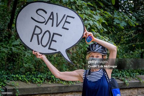 Participant Holding A Save Roe Sign At The Protest Political News