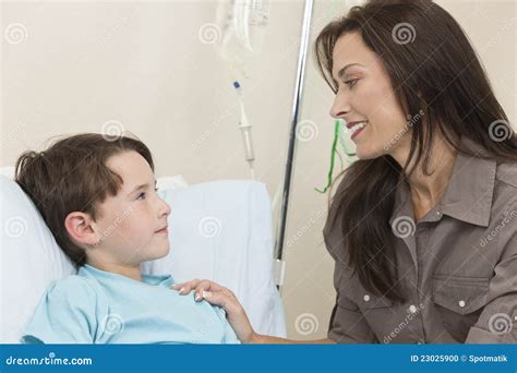 Young Boy Child Patient Hospital Bed With Mother Stock Photo - Image ...