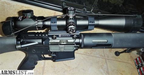 ARMSLIST - For Sale: AR15 - Bushmaster XM15-E2S with Scope