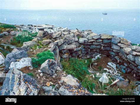 Ancient pit house ruins at Cape Dezhnev, Russian Far East, the furthest east of Eurasia Stock ...