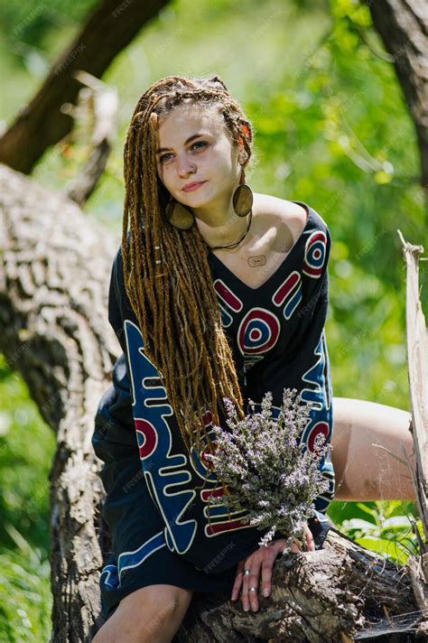 Premium Photo Beautiful Girl With Dreadlocks Dressed Hippie Styleposes Outdoors