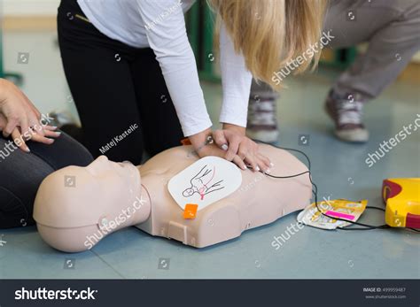 First Aid Cardiopulmonary Resuscitation Course Using Stock Photo