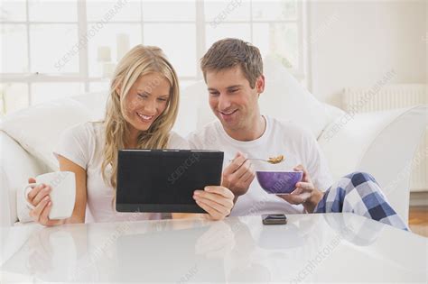 Couple Using Tablet Computer At Table Stock Image F0058697