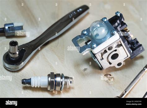 Carburetor And Parts Forsmall 2 Stroke Engine Repair Stock Photo Alamy