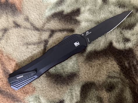 Kershaw Livewire Otf Automatic Part Serrated Edge Blkst Magnacut