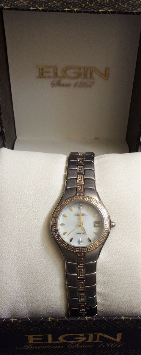 Elgin Womens Crystal Watch Round Pearl Dial With Date Displaying