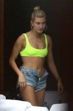 Hailey Baldwin In Bikini Top And Denim Shorts At A Pool In Miami