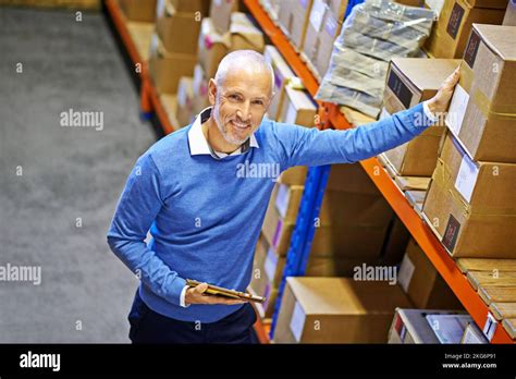 Ive Got Your Order Right Here Portrait Of A Mature Man Working Inside