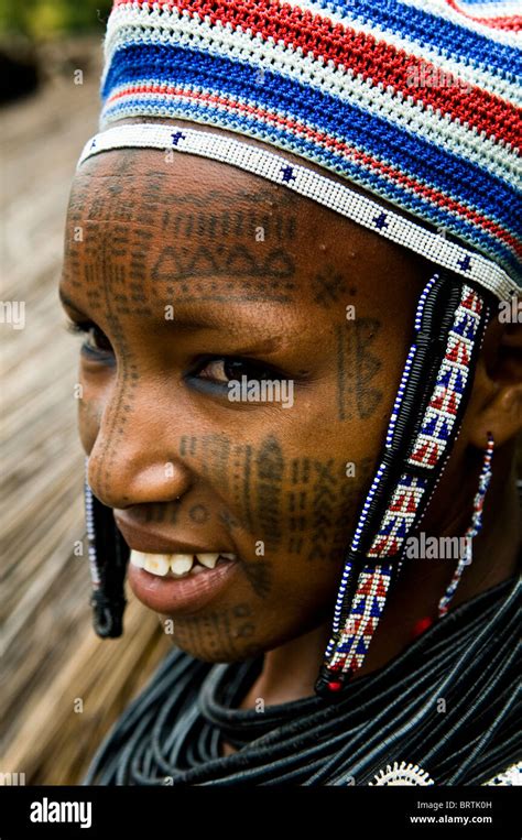 A Beautiful Peul Fulani Woman Covered With Facial Tattoos Stock Photo