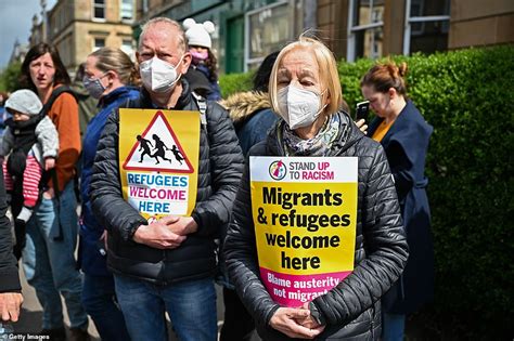 Hundreds Of Protesters Lie Under Home Office Van To Block Immigration