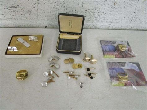 Assortment Of Men S Costume Jewelry Oberman Auctions