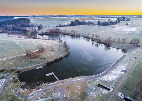 Aerial View Of Aichstrut Reservoir In Winter At Sunrise Stock Photo