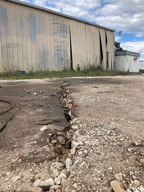 Photos: Newly active Texas sinkhole unearths forgotten fears | News ...