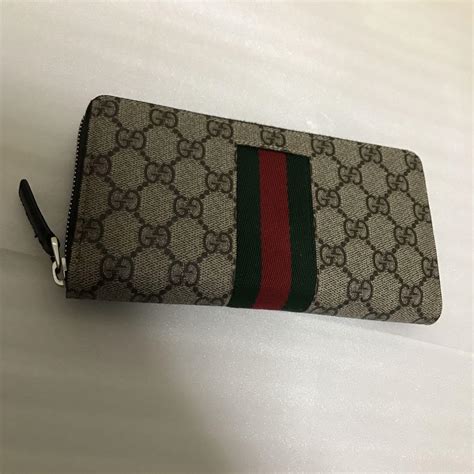 せんので ほぼ未使用 Gucci グッチ Pvc ラウンドファスナー 長財布シェリーライン いただいて